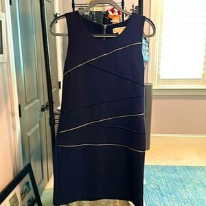 This is a Michael kors black sleeveless cotton knit dress in a size 4.